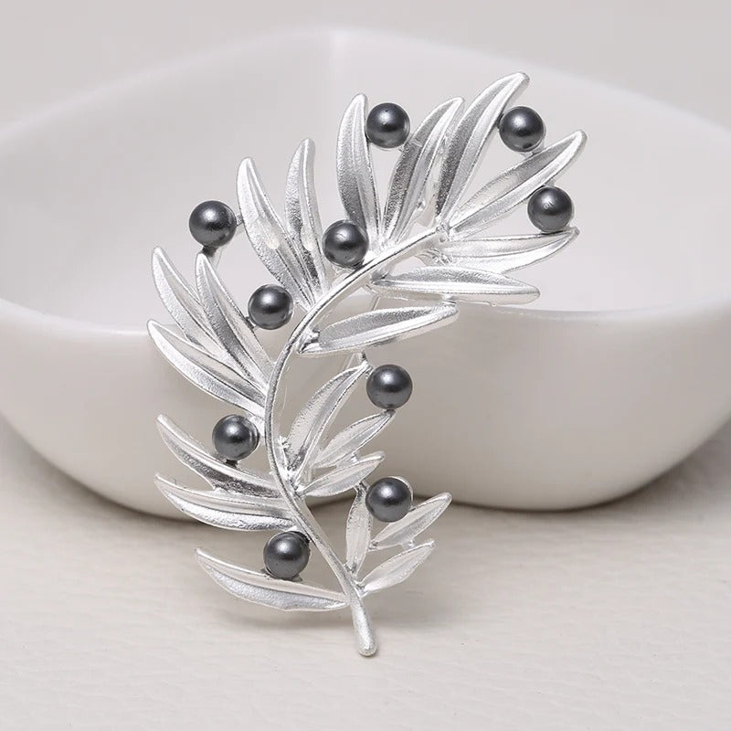 BROOCHES