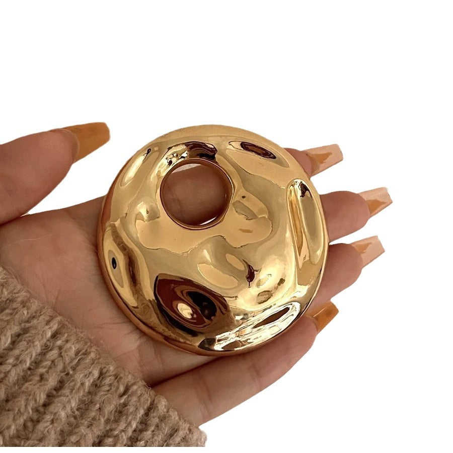 Titan Brooch