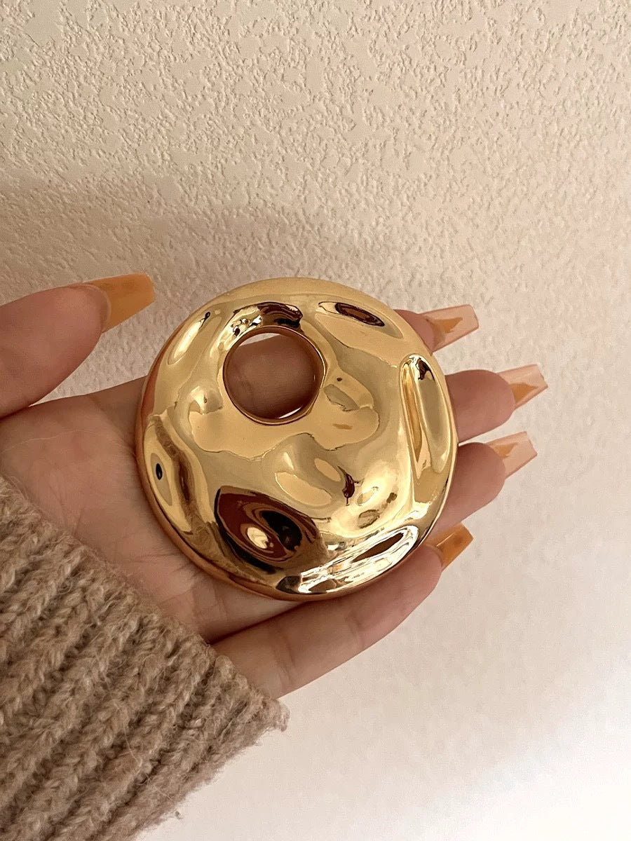 Titan Brooch